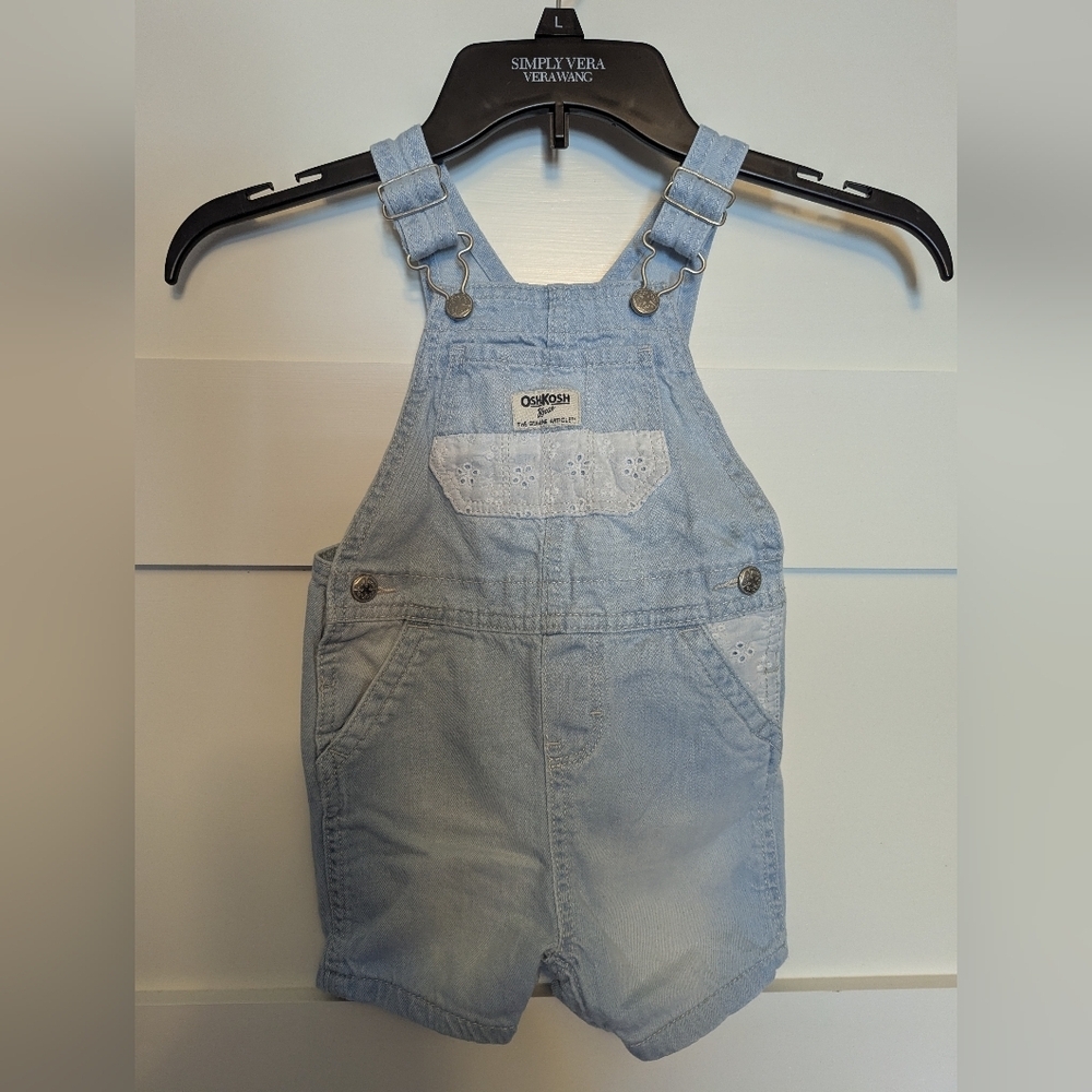 Oshkosh B'gosh light wash toddler overalls with lace trim. Size 24 months.